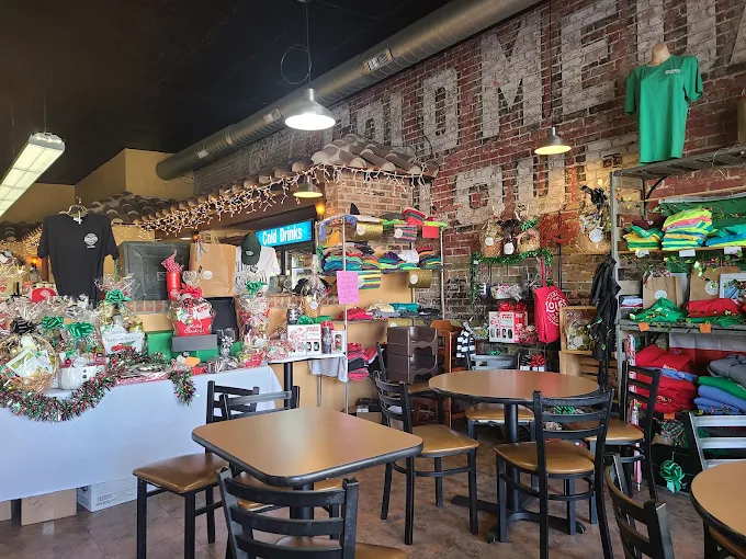 Merch tables and the brick wall inside Louie's