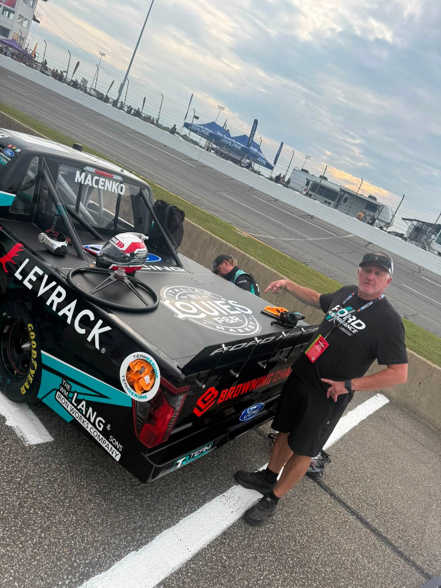 NASCAR race truck carrying the Louie's P&R logo